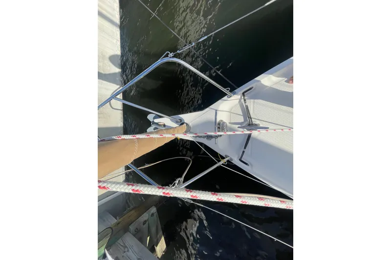 Slide: The Image of Sailboat deck view of 2013 Hake Seaward 26RK with ropes and railing. - 9
