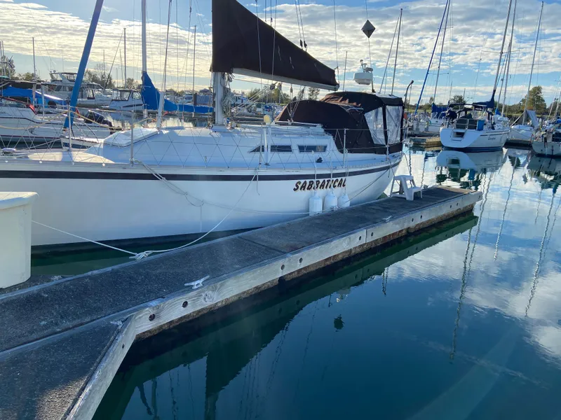 The Image of 1981 CS 33 sailboat docked in marina. - 0