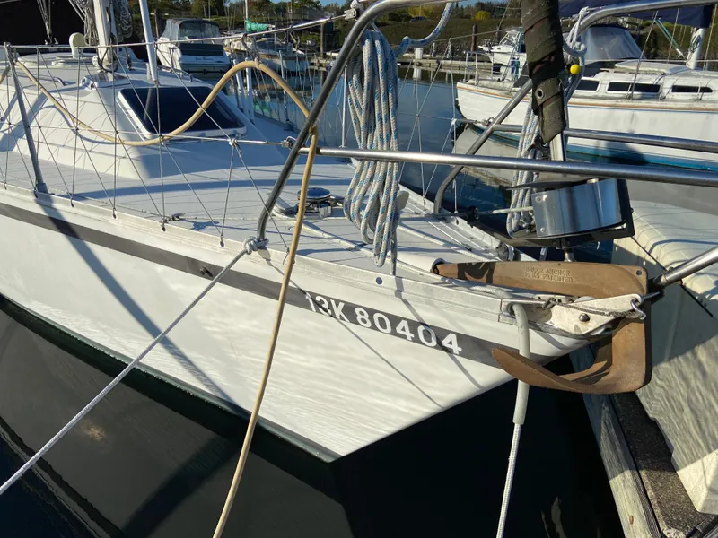 Slide: The Image of 1981 CS 33 sailboat docked at the marina. - 14