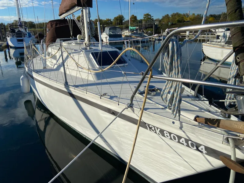 Slide: The Image of 1981 CS 33 sailboat docked in marina. - 15
