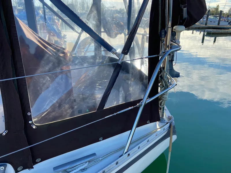 Slide: The Image of 1981 CS 33 sailboat with clear cover in harbor. - 41