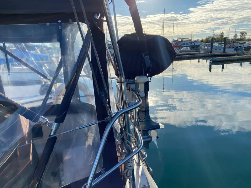 Slide: The Image of 1981 CS 33 sailboat docked in calm harbor at sunset. - 42