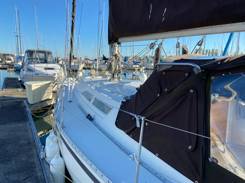 Slide: The Image of 1981 CS 33 sailboat docked in marina. - 45