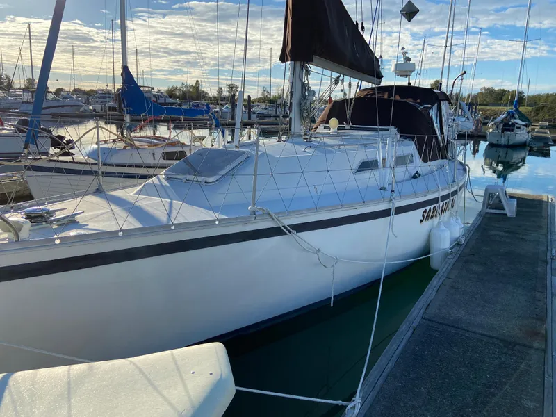 Slide: The Image of 1981 CS 33 sailboat docked in marina. - 8