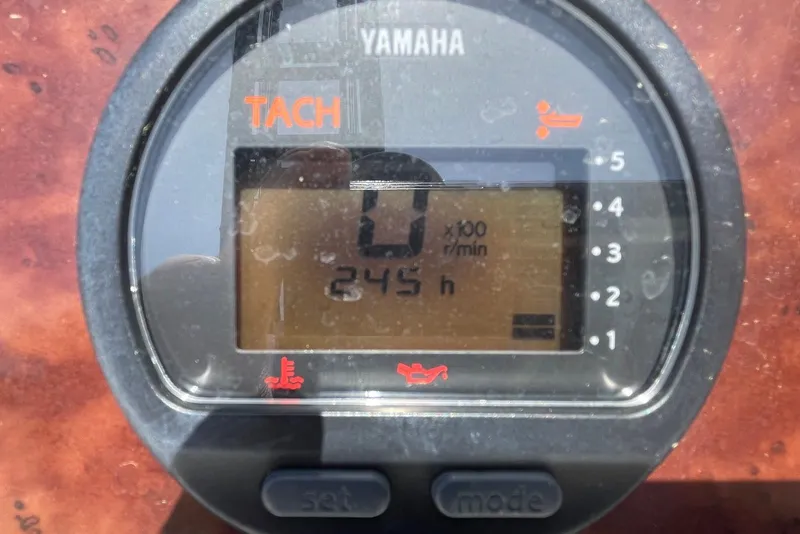 Slide: The Image of Yamaha tachometer displaying 245 hours on a 2013 Sea Hunt Escape 211 LE boat. - 14