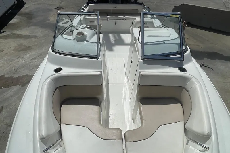 Slide: The Image of 2013 Sea Hunt Escape 211 LE boat interior with seating and windshield. - 5