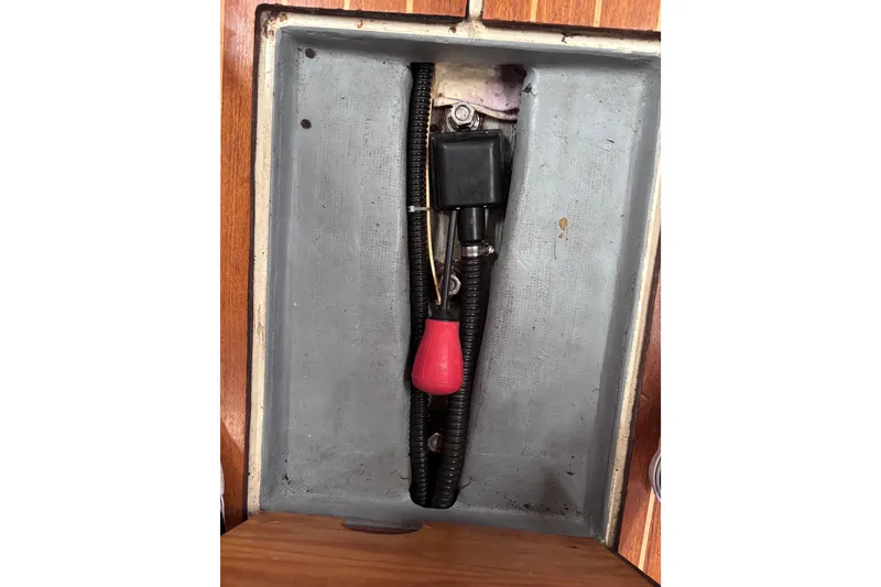 Slide: The Image of Electrical compartment of a 1986 Pearson 28 sailboat with wiring and components. - 22