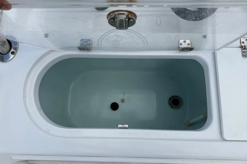 Slide: The Image of Livewell compartment on a 2022 Century 2600 Center Console boat. - 19