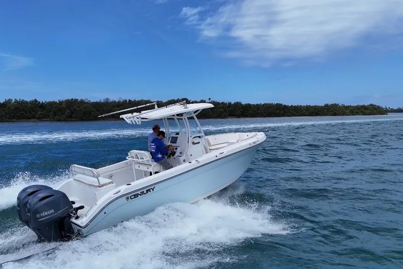 Slide: The Image of 2022 Century 2600 Center Console boat cruising on open water. - 6