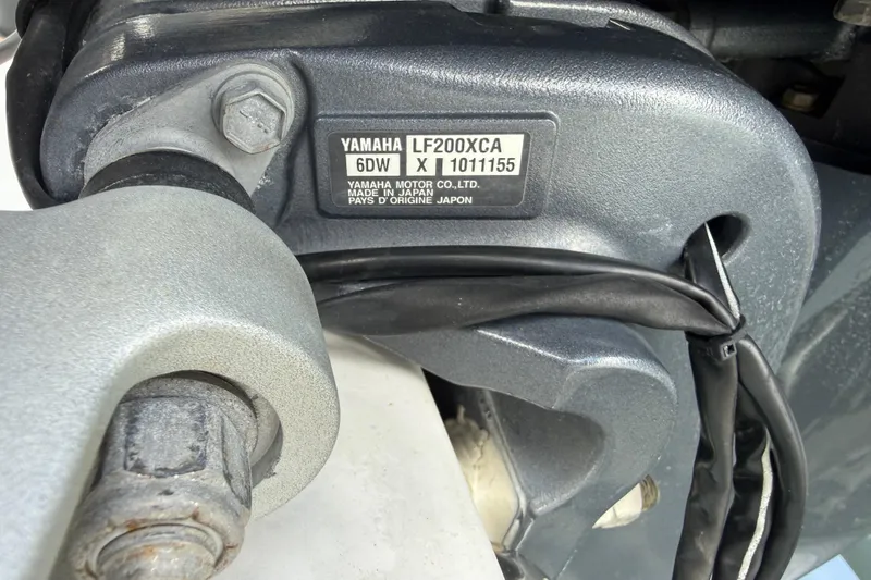 Slide: The Image of Close-up of Yamaha LF200XCA engine part on 2022 Century 2600 Center Console boat. - 60