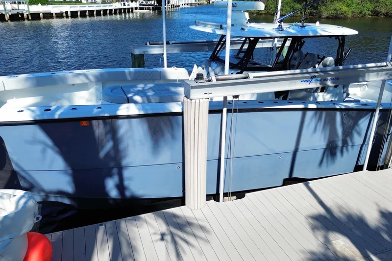 Slide: The Image of 2019 Freeman 42LR boat docked by the water on a sunny day. - 15