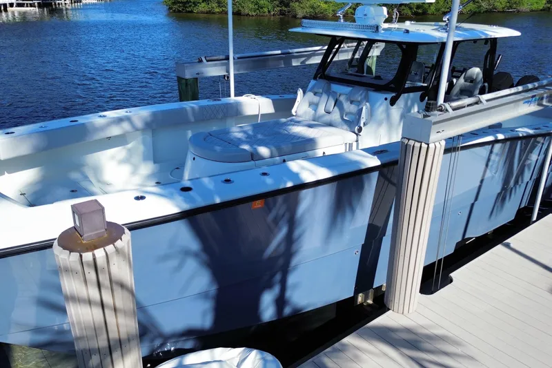 Slide: The Image of 2019 Freeman 42LR boat docked on a sunny day. - 16