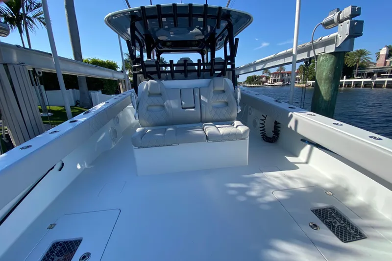 Slide: The Image of 2019 Freeman 42LR boat interior with cushioned seating and sleek design. - 22