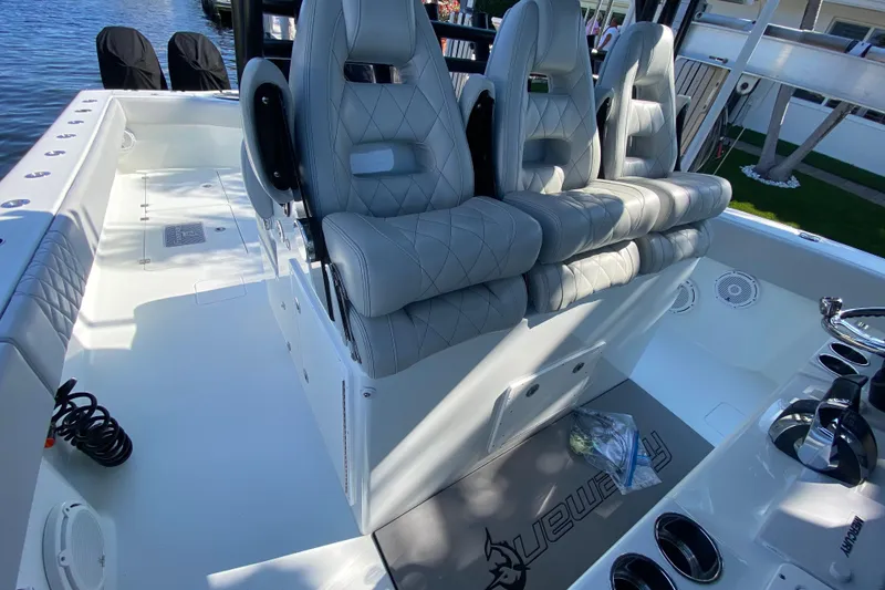 Slide: The Image of Luxurious seating on a 2019 Freeman 42LR boat, featuring sleek design and premium materials. - 24