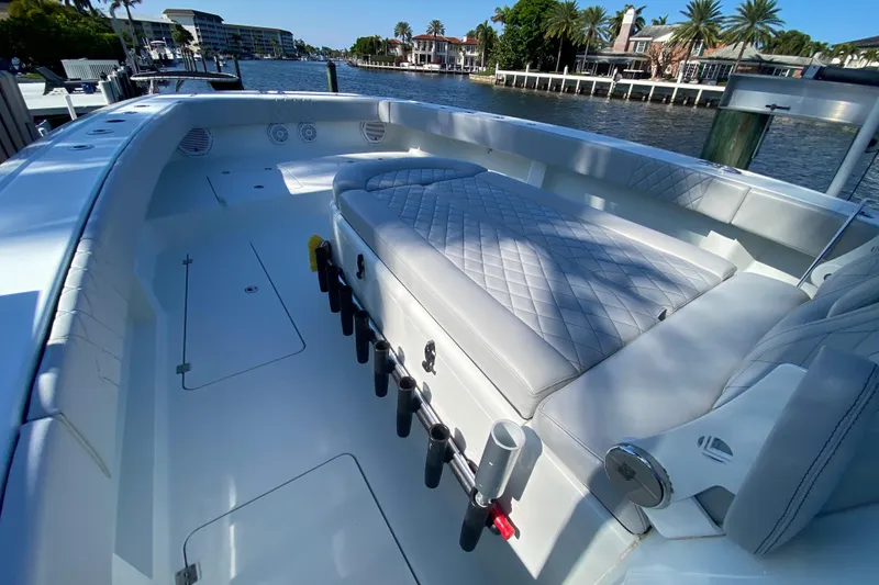 Slide: The Image of Luxurious 2019 Freeman 42LR boat interior with spacious seating and scenic waterfront view. - 26