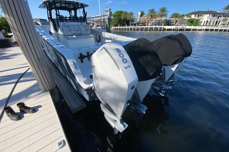 Slide: The Image of 2019 Freeman 42LR boat docked with powerful Mercury 300 V8 engines. - 31
