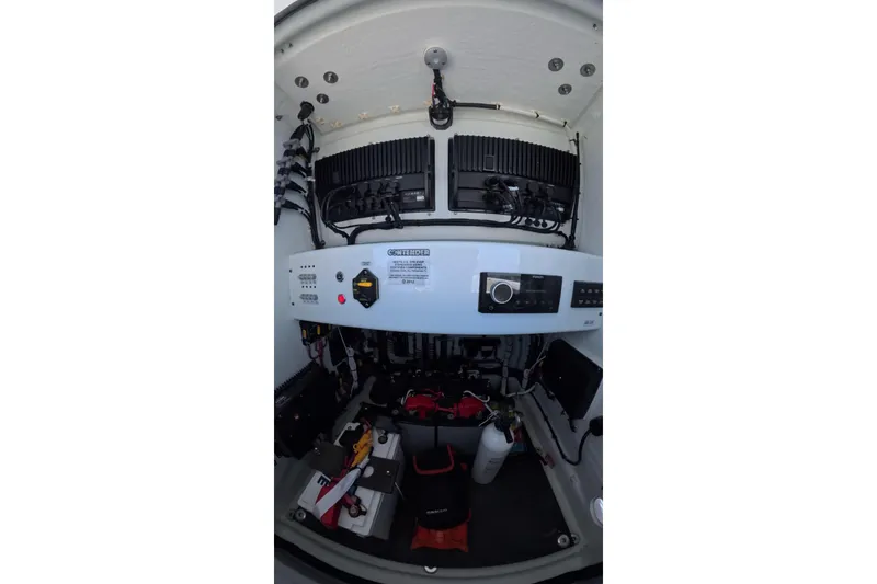Slide: The Image of Interior view of 2025 Contender 26 Bay with electronics and controls. - 14