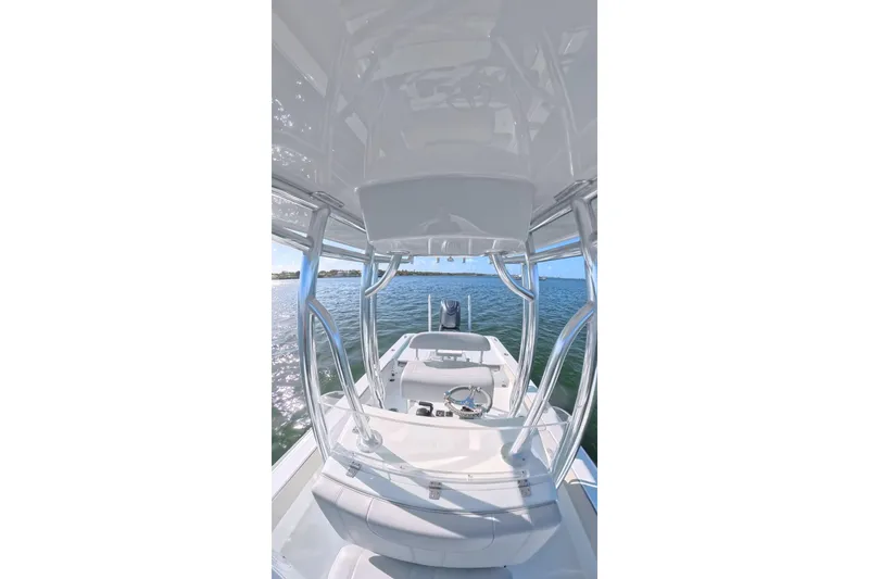 Slide: The Image of 2025 Contender 26 Bay boat interior with ocean view, featuring sleek design and modern amenities. - 17