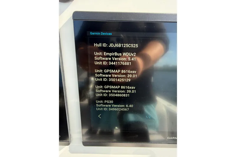 Slide: The Image of Garmin device display on 2025 Contender 26 Bay boat showing software versions and unit IDs. - 30
