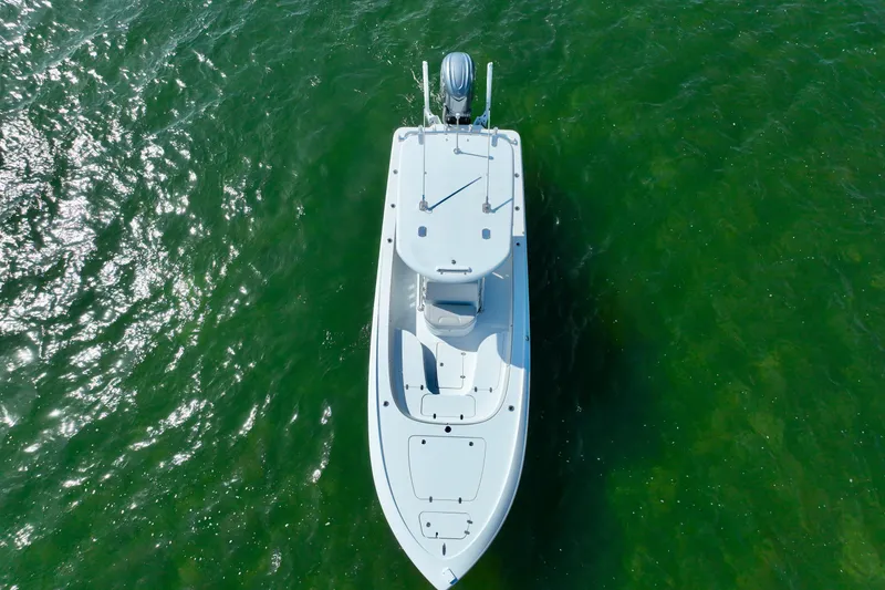Slide: The Image of Aerial view of 2025 Contender 26 Bay boat on green water. - 32