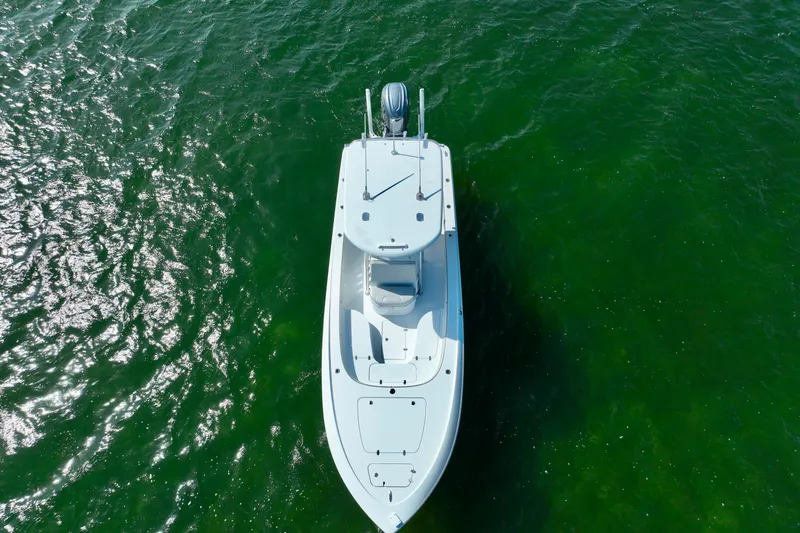 Slide: The Image of Aerial view of 2025 Contender 26 Bay boat on green water. - 6