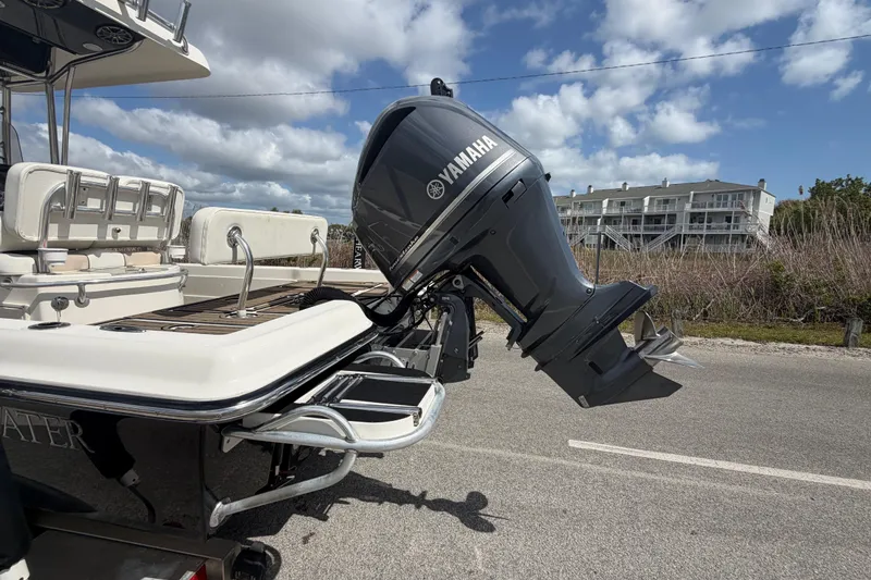 Slide: The Image of 2013 ShearWater 25 LTZ boat with Yamaha outboard motor on a sunny day. - 19