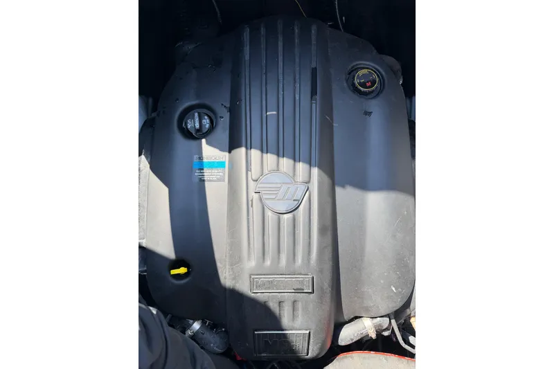 Slide: The Image of 2022 Malibu Wakesetter 25 LSV engine close-up, showcasing detailed components and design. - 10