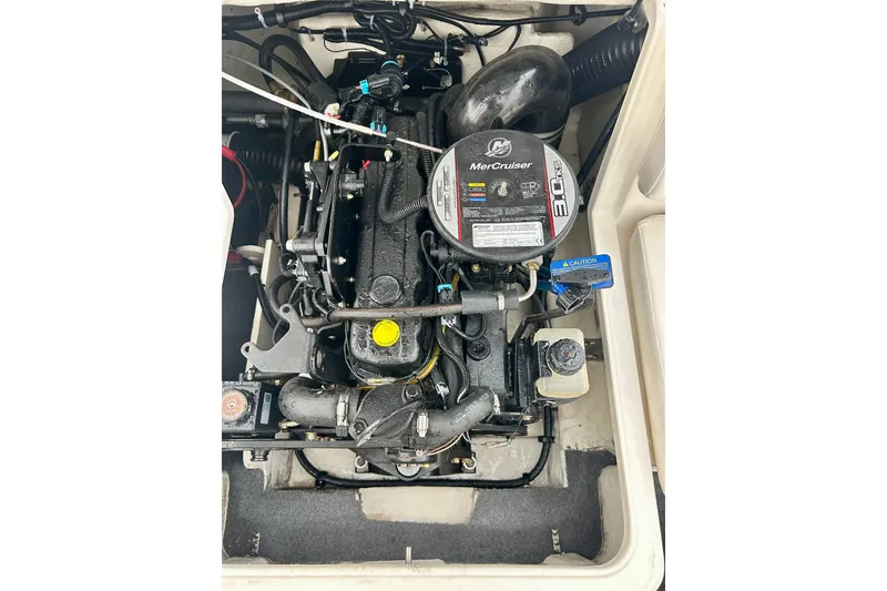 Slide: The Image of 2016 Bayliner 175 Bowrider engine compartment with MerCruiser 3.0L engine. - 10