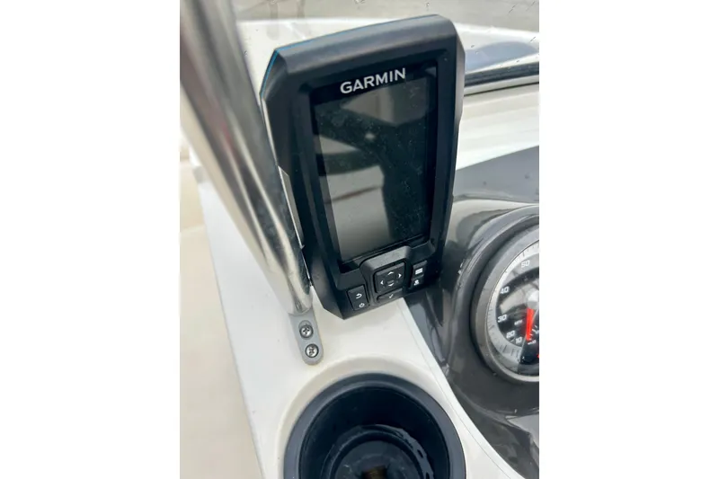 Slide: The Image of Garmin device on 2016 Bayliner 175 Bowrider dashboard, next to speedometer. - 12