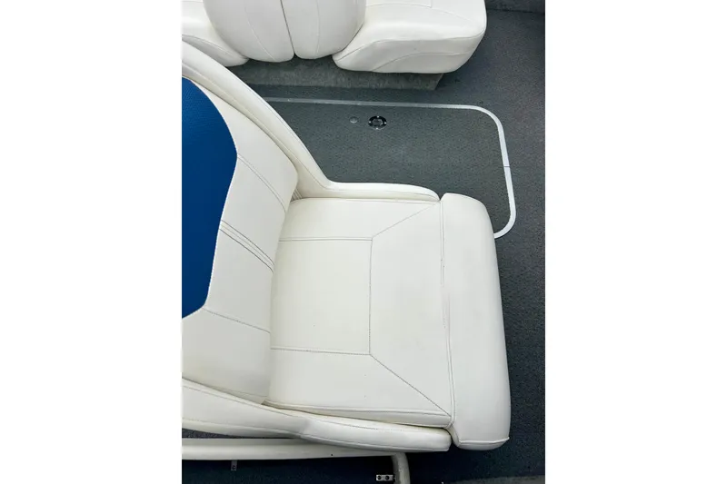 Slide: The Image of 2016 Bayliner 175 Bowrider interior with white and blue seating. - 20