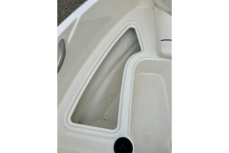 Slide: The Image of Interior view of a 2016 Bayliner 175 Bowrider boat's storage compartment. - 23