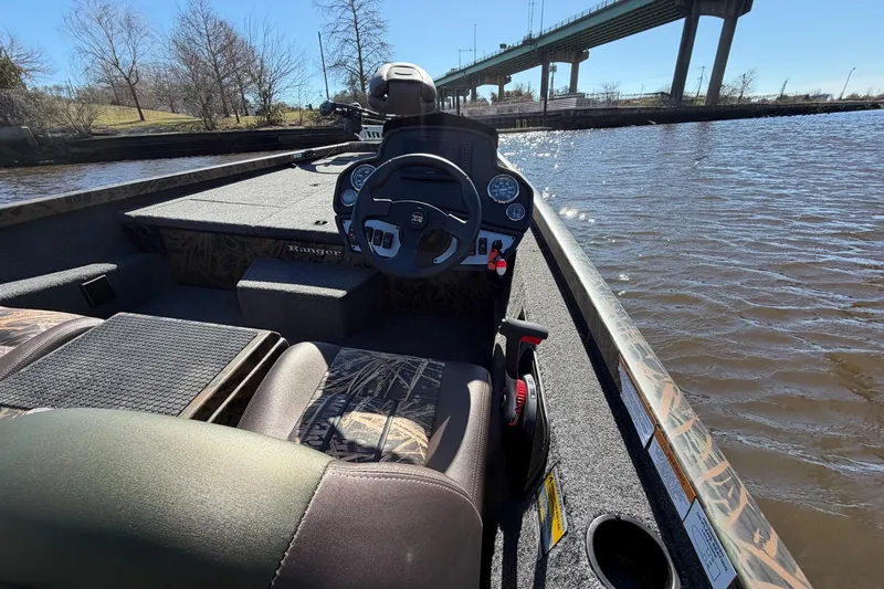 Slide: The Image of 2019 Ranger RT188P Fishing boat on a river near a bridge. - 14
