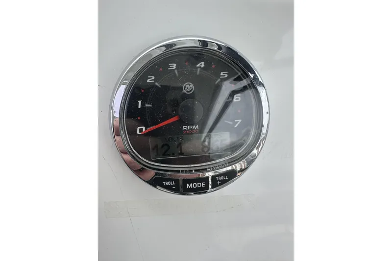 Slide: The Image of Close-up of a Beneteau Antares 7 tachometer, displaying RPM and voltage. - 10