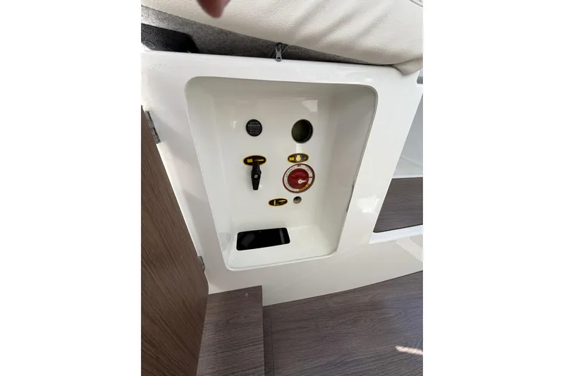 Slide: The Image of Control panel inside 2020 Beneteau Antares 7 boat, featuring switches and dials. - 18