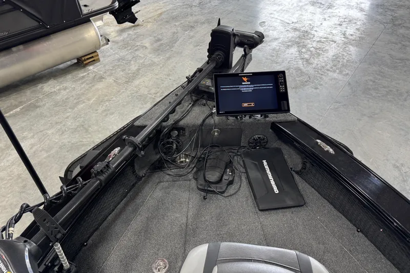 Slide: The Image of 2024 Lund 2075 Pro-V boat interior with advanced navigation system and Humminbird electronics. - 9