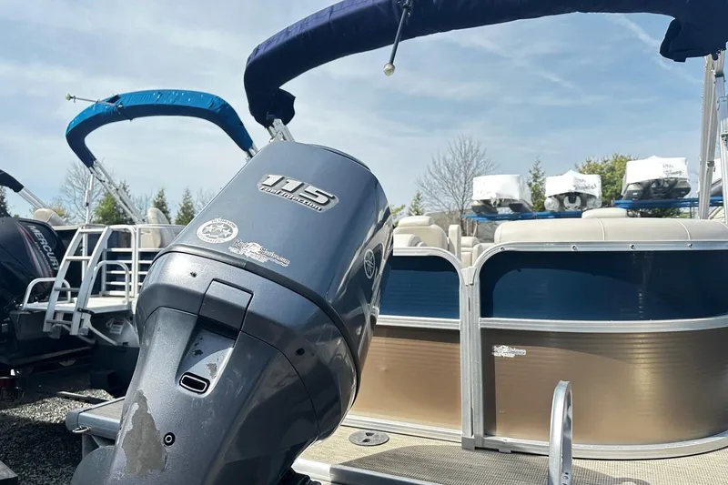 Slide: The Image of 2014 Misty Harbor 2286 Pontoon Salt Water Series with outboard motor and boarding ladder. - 14