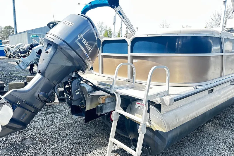 Slide: The Image of 2014 Misty Harbor 2286 Pontoon with Yamaha motor, docked on gravel. - 4