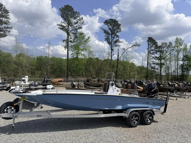 The Image of 2026 Xpress Hyper-Lift H22B boat on trailer, outdoor display. - 1