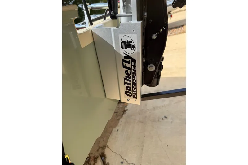 Slide: The Image of Close-up of OnTheFly Jack Plates on a 2026 Santee 160 Tiller Steer boat. - 6