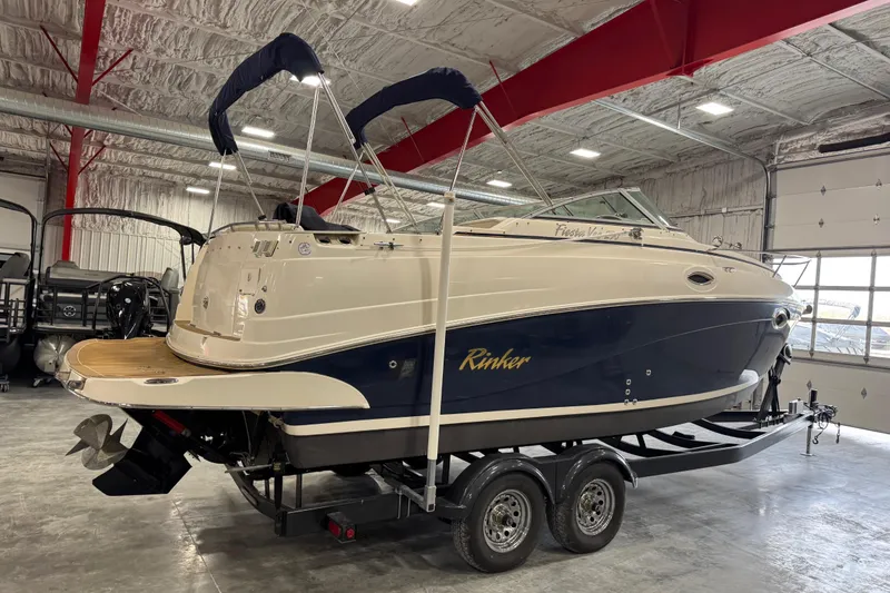 Slide: The Image of 2006 Rinker Fiesta Vee 250 boat on trailer in indoor storage facility. - 4