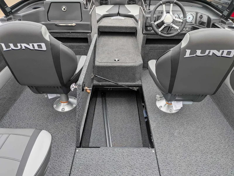 Slide: The Image of Interior of 2026 Lund 1875CROSSOVERXS with gray seats and steering wheel. - 7