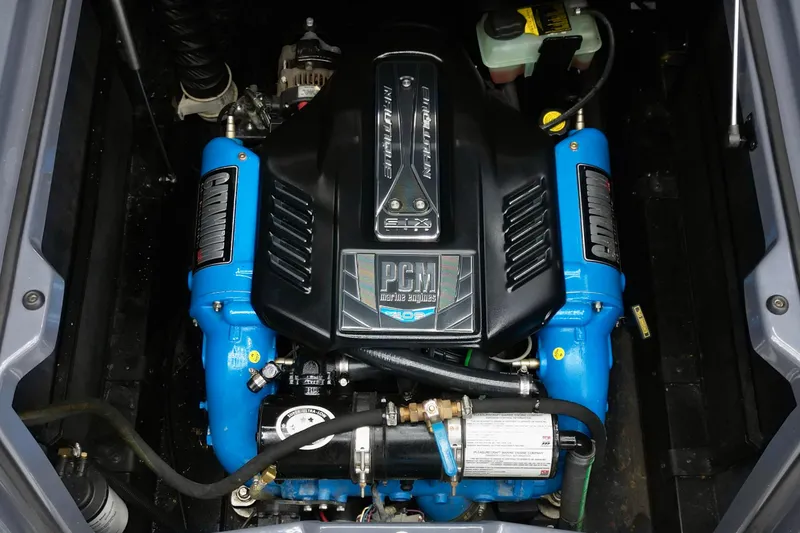 Slide: The Image of Engine of 2014 Nautique Super Air Nautique G21 boat, featuring PCM components. - 12