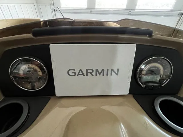 Slide: The Image of Dashboard of 2026 Evotti 523CS featuring Garmin display. - 15