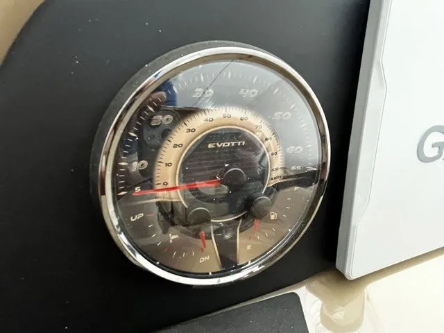 Slide: The Image of Evotti 523CS 2026 speedometer displaying speed readings. - 16
