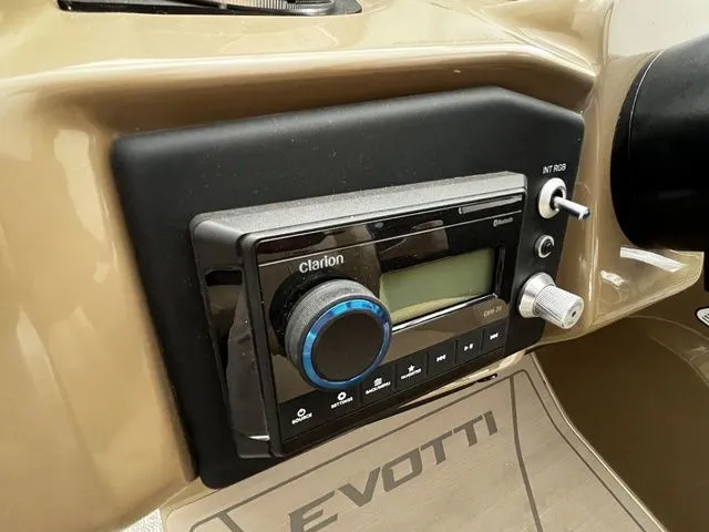 Slide: The Image of Evotti 523CS 2026 dashboard featuring Clarion Bluetooth stereo system. - 17