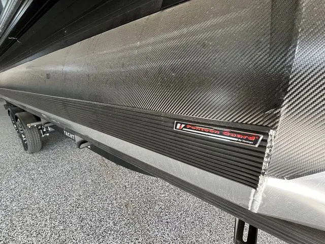 Slide: The Image of Evotti 523CS 2026 with carbon fiber design and Phantom Guard label. - 3