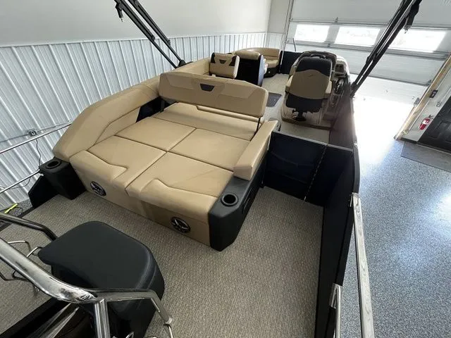 Slide: The Image of Interior view of Evotti 523CS boat, 2026 model, featuring beige seating. - 7