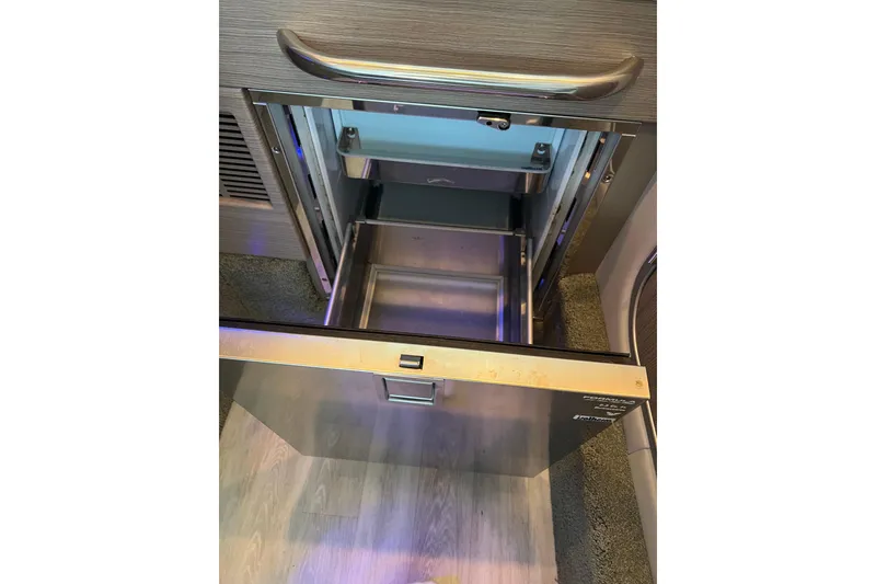 Slide: The Image of Open stainless steel drawer in 2019 Formula 350 Crossover Bowrider I/O boat interior. - 13