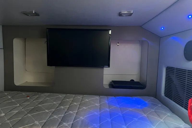 Slide: The Image of Interior cabin of 2019 Formula 350 Crossover Bowrider with TV and ambient lighting. - 16