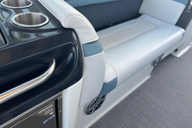 Slide: The Image of 2019 Formula 350 Crossover Bowrider I/O interior with seating and cup holders. - 25